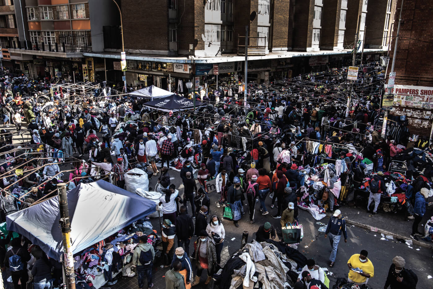 At the intersection of De Villiers and King George Streets a huge second-hand clothing market, known locally as Dunusa – an isiZulu word that means ‘to bend over’.
